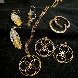 4 earrings and a matching necklace